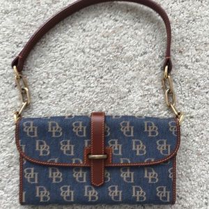 Dooney and Bourkr signature denim clutch/wallet